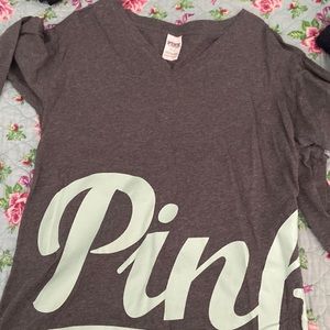Pink long sleeve size Small  fits medium